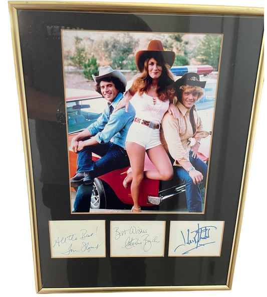 Vintage The Dukes Of Hazzard Framed Photograph With Autographs Of Bo, Luke And Daisy Duke - Autographed By Tom Wopat, John Schneider & Catherine Bach - Ultra Rare