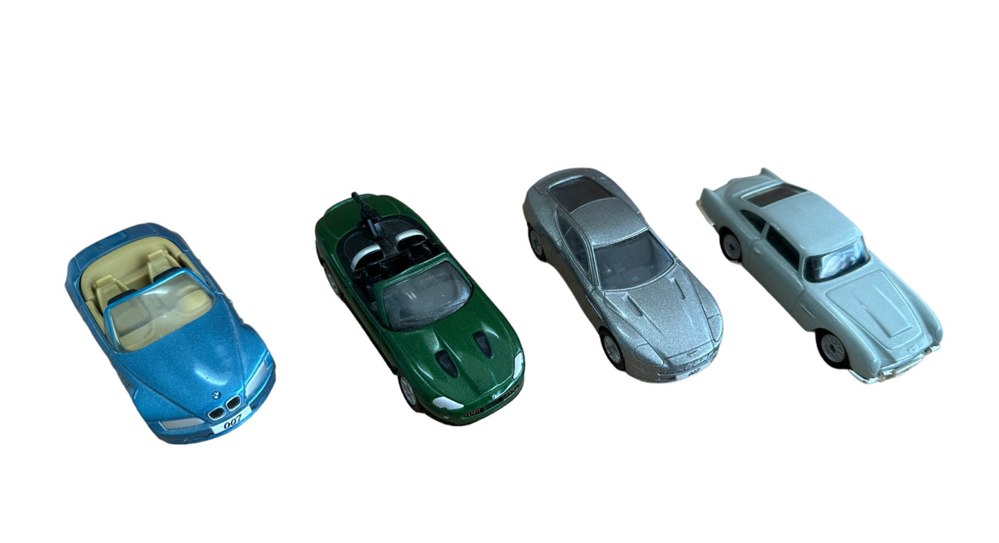 Vintage 2003 Corgi The James Bond Collection Set Of 4 1/50 Scale Die-cast Model Vehicles - DB5, V12 Vanquish, Z3 & XKR - Film Cannister Gift Set No. TY95903