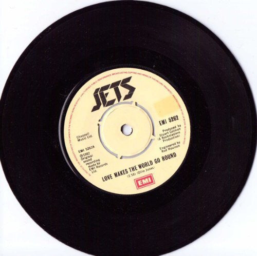 The Jets A.Side Love Makes The World Go Round, B.Side I'm Just A Score EMI Records Label 1982 7" Vinyl Single