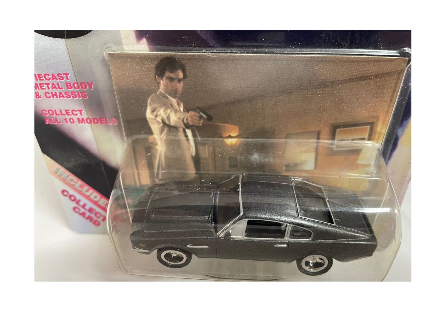 Vintage 1999 Corgi James Bond 007 - The Living Daylights - Aston Martin V8 Vantage Volante 1:65 Scale Die-Cast Vehicle Replica Number 99658 - Includes Free Collectors Card - Brand New Factory Sealed Shop Stock Room Find
