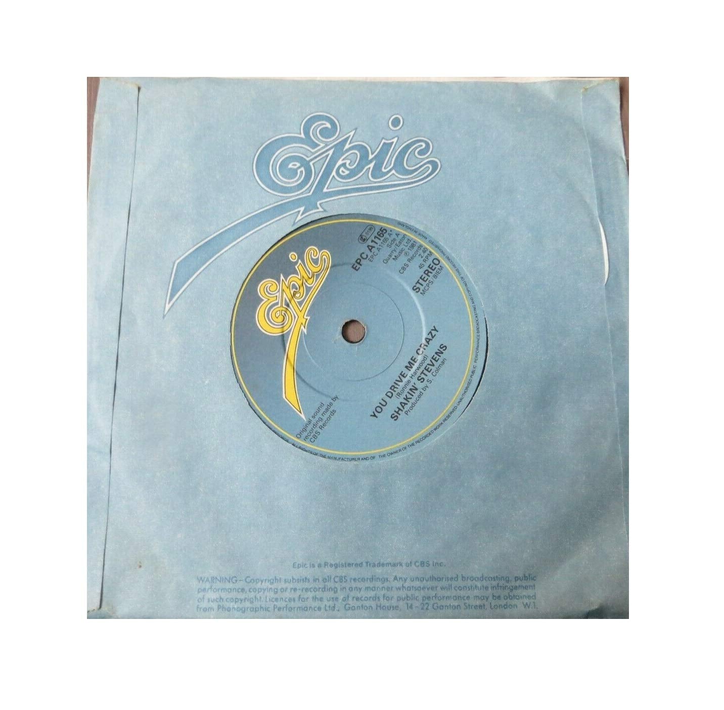 Shakin Stevens A.Side You Drive Me Crazy, B Side Baby Your A Child, Epic Records Label 1981, 7 inch vinyl Single
